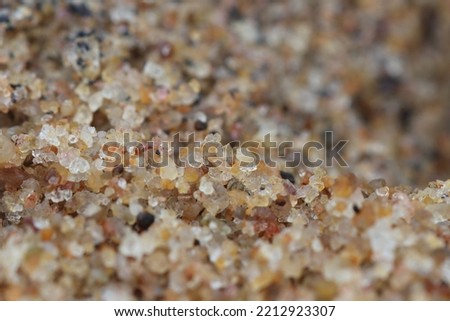 Gopalpur, Odisha, India - October 9, 2022: Macro photograph of sand grains on the sea beach