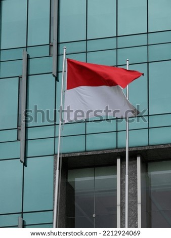 Indonesian flag under blue sky independence day concept