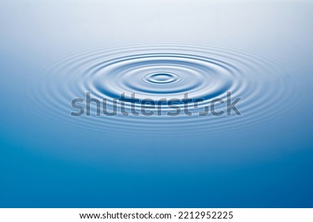 water drop ripple on blue