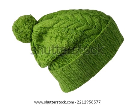   knitted green hat isolated on white background.hat with pompon . Royalty-Free Stock Photo #2212958577