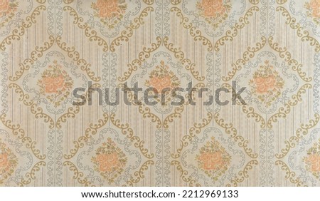 Old wallpaper on the wall. Old wallpaper for texture or background. Royalty-Free Stock Photo #2212969133