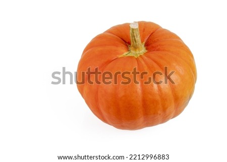 Orange pumpkin with shadow on a white isolated background.