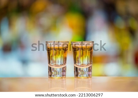 Pair of Anaconda shots on a bar