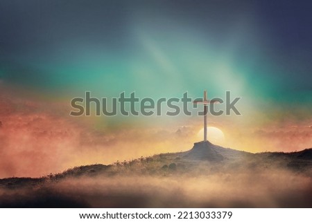 Silhouette of christian cross on mountain hill background. Copy space. Faith symbol. Church worship, salvation concept. Faith symbol in Jesus Christ. Holy cross for Easter day. Christianity