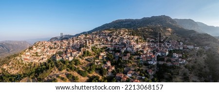Arachova Greece mountain town aerial panoramic view. Traditional houses tourist resort famous for outdoor activities, Boeotia.