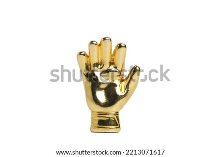 A picture of miniature golden gloves on white background. Award for Best Goalkeeper.