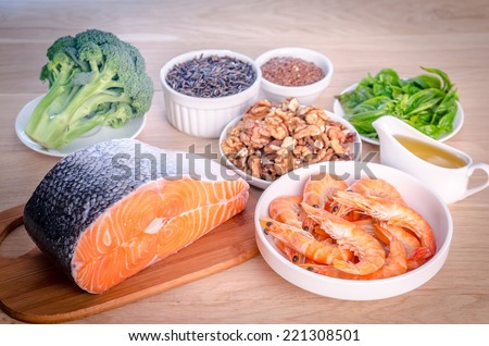 Plant-based and animal sources of Omega-3 acids Royalty-Free Stock Photo #221308501