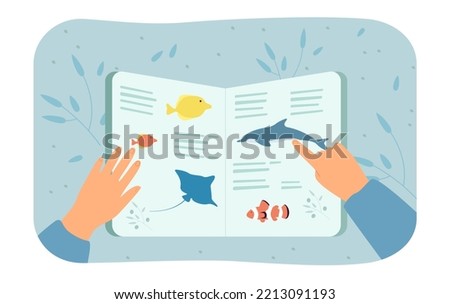 Hands holding open book with images of sea animals and fishes. Person studying marine life flat vector illustration. Education, encyclopedia concept for banner, website design or landing web page Royalty-Free Stock Photo #2213091193