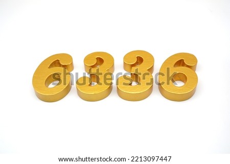  Number 6336 is made of gold-painted teak, 1 centimeter thick, placed on a white background to visualize it in 3D.                                