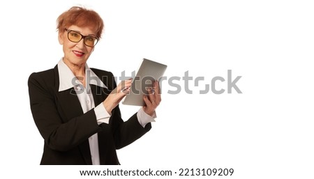 Portrait of confident senior executive manager. Stylish middle age woman in black business suit isolated on white background. Concept of human rights, feminism, old generation, skills and achievements