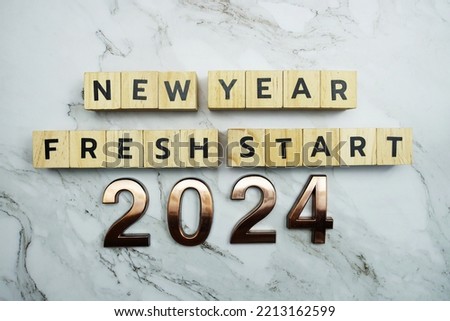 New Year Fresh Start 2024 text on marble background Royalty-Free Stock Photo #2213162599