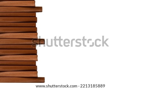 Banner with books stack in brown cover isolated on white background. Education, wisdom, preparing for exams, project conducting, knowledge-enhancement concept. Copy space. High quality photo