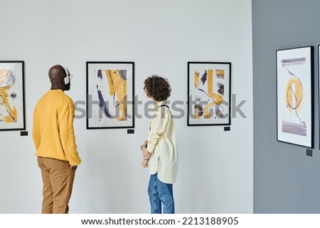 People visiting gallery of modern art