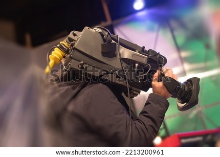 cameraman in the studio on the set of a TV show