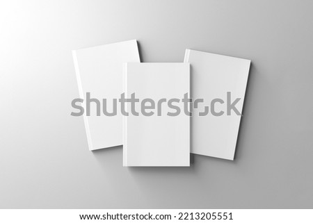 isolated on gray background. 3 white cover book mockup. 3D Render books.