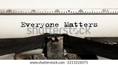 The text EVERY ONE MATTERS is typed on paper by an antique typewriter. Vintage inscription, retro style, grunge, concept.
