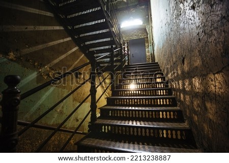 Old forged iron staircase in shabby historical building
