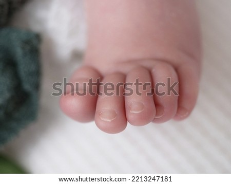 small legs of a newborn close-up, foot, foot, toes, heel of babies