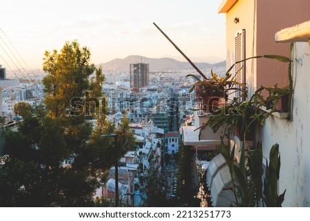 Piraeus city, Attica, beautiful panoramic view of Piraeus, Greece, with harbour and port, mountains and scenery beyond the city, seen from Prophet Helias Hill on Kastela Hill, sunset summer view Royalty-Free Stock Photo #2213251773