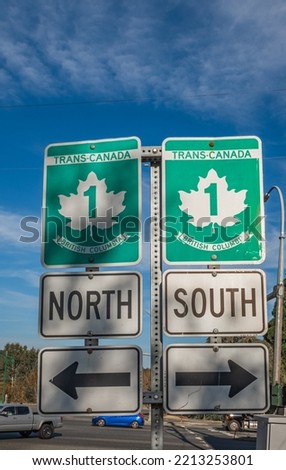 Signpost of Trans Canada 1 Highway in British Columbia, north and south direction. Nobody, street view, travel photo, selective focus