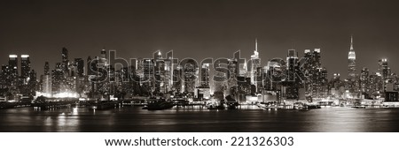 Midtown Manhattan skyline in black and white at dusk panorama over Hudson River