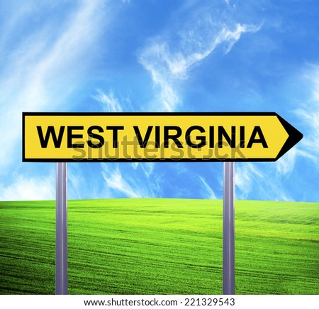 Conceptual arrow sign against beautiful landscape with text - WEST VIRGINIA