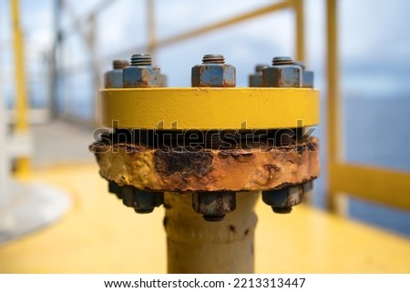 Close-up of corroded steel pipe flange, corrosion of steel, general corrosion, offshore petroleum pipelines. Royalty-Free Stock Photo #2213313447