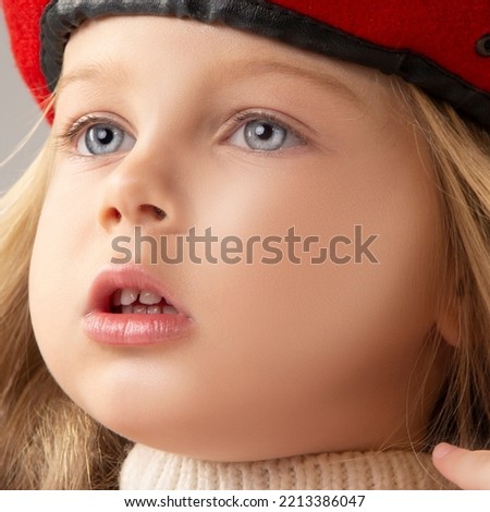 Close-up beauty face of little girl todler, beautiful kid studio portrait