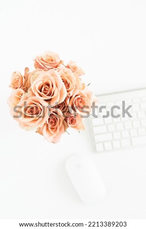 Peach orange roses and pastel colors. Luminous bouquet in metal bucket. A bouquet of peach-colored pink roses. Natural pastel of roses