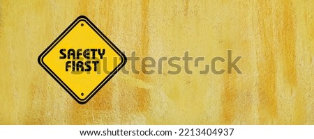 safety first sign on the wall
