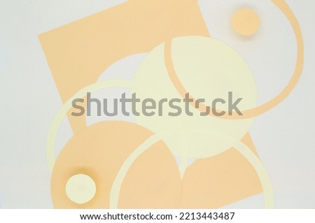 Abstract background with 3D paper elements in beige, orange colors resembles female forms - chest, abdomen. Backdrop advertising products, copy space.