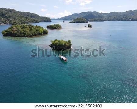 a diving boat around lembeh strait Royalty-Free Stock Photo #2213502109