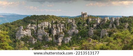 Rocks with strange shapes in the chaos of Montpellier-le-Vieux in the cevennes national park. Panorama, panoramic.. City of Stones, La Roque-Sainte-Marguerite, Aveyron, France. Royalty-Free Stock Photo #2213513177