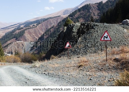 Road sign on a dangerous mountain road