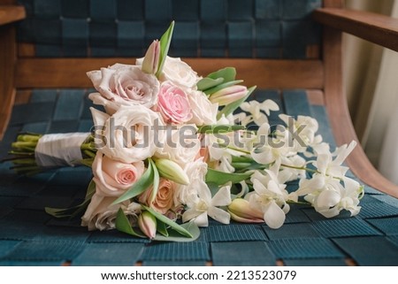 roses tulips and orchids bridal wedding bouquet Royalty-Free Stock Photo #2213523079