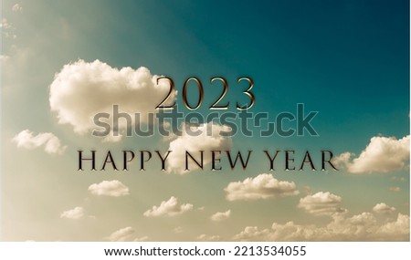 Blue dark moody sky background Web Banner with clouds and 2023 Happy new year. Sunny Travel Day. Cumulus sky. Meteorology, Climate Travel Vacation Concept. Royalty-Free Stock Photo #2213534055