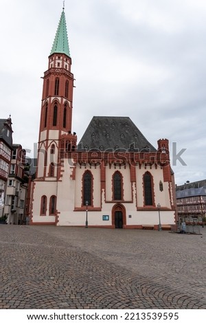 Old church of Saint Nicolas, in the central square of the city of Frankfurt, on a cloudy day without people.