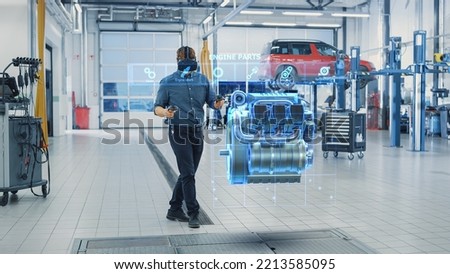 Professional Car Service Manager Uses a Futuristic Virtual Reality Headset Diagnostics Gadget with Controllers. Specialist Inspecting the V6 Internal Combustion Engine for Parts and Component Numbers.