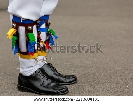 The leg bells and ribbons of an Oxfordshire Morris Dancer  Royalty-Free Stock Photo #2213604131
