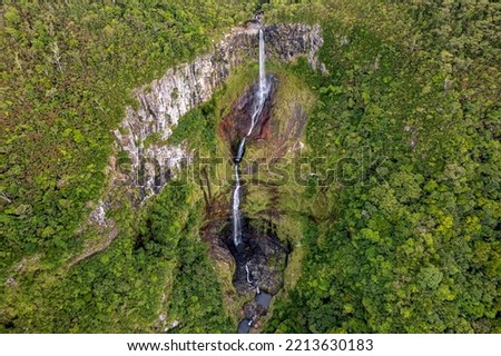 Aerial top view perspective of 500ft Waterfall in the tropical island jungle of Mauritius