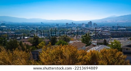 Reno autumn city skyline at sunrise, the state capital of Nevada hilltop view