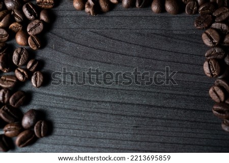 Coffee beans scattered on the table. Good for Copy-Space backgrounds