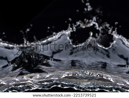 Waves and streams of pure water. Flow textures and natural water movements, transparent patterns and black background backdrops. water splashes into the air