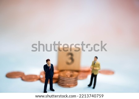 Miniature Business man thinking.Business obstacle,financial,business growth concept.Business man stand on center of maze.