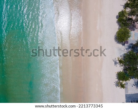 Aerial view top view beach sand and sea water clear