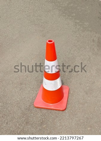 Orange traffic cone for marking and safety sign