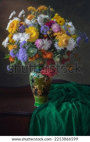 Still life with bouquet of colorful chrysanthemums