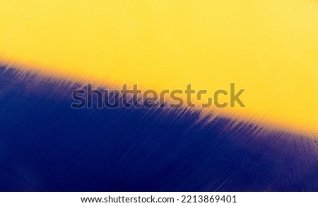 Blue and yellow colors paper texture background. Motion blur texture background. Place for text. Abstract rain lines. Blue and yellow abstract pattern.