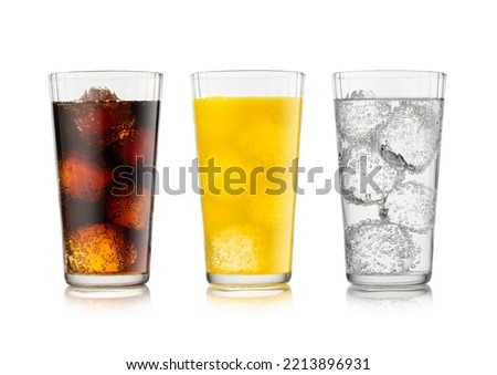 Cola soda drink with lemonade and orange soda with ice cubes and bubbles on white. Royalty-Free Stock Photo #2213896931