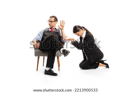 Portrait of man, office manager and woman, employee isolated over white studio background. Secretary and boss. Concept of business, office lifestyle, success, ballet, control, expression, ad